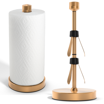 Gold paper towel holder with a roll of paper towels on a white background