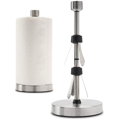 A stainless steel paper towel holder with a weighted base and suction cups, designed for countertop use. It is displayed alongside a roll of paper towel.