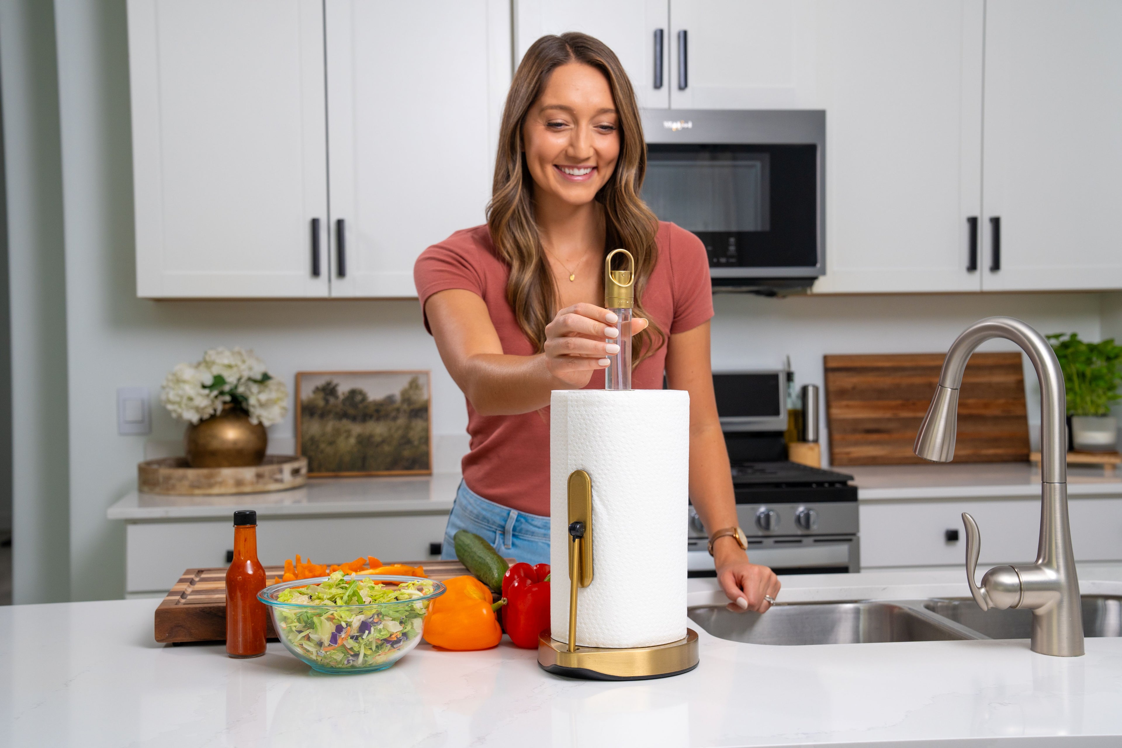 Load video: Dear Household paper towel holder with tension arm and suction cups designed for one handed tear and includes a built in sprayer