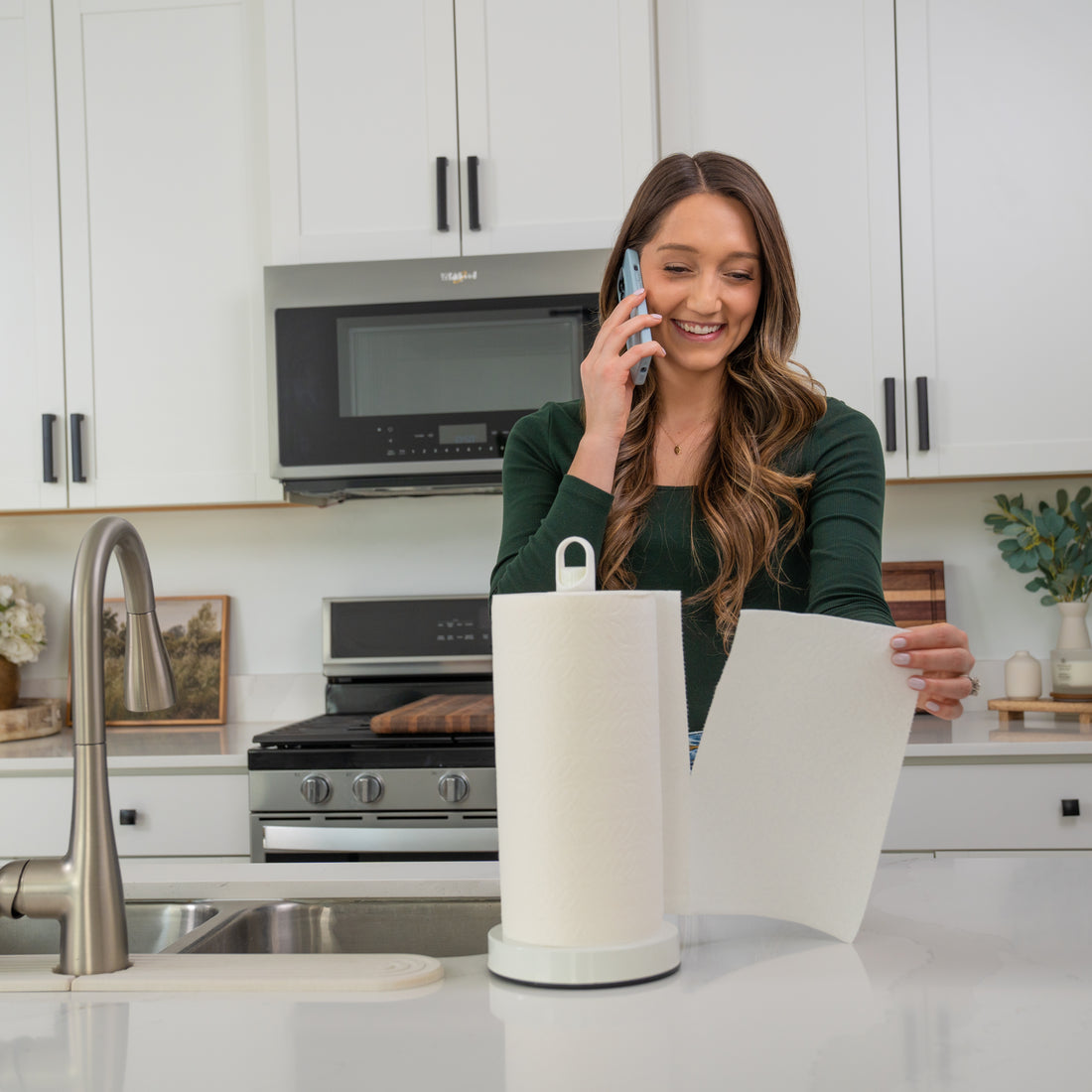 Dear Household paper towel holder with traction system built for one handed tear and includes a built in sprayer